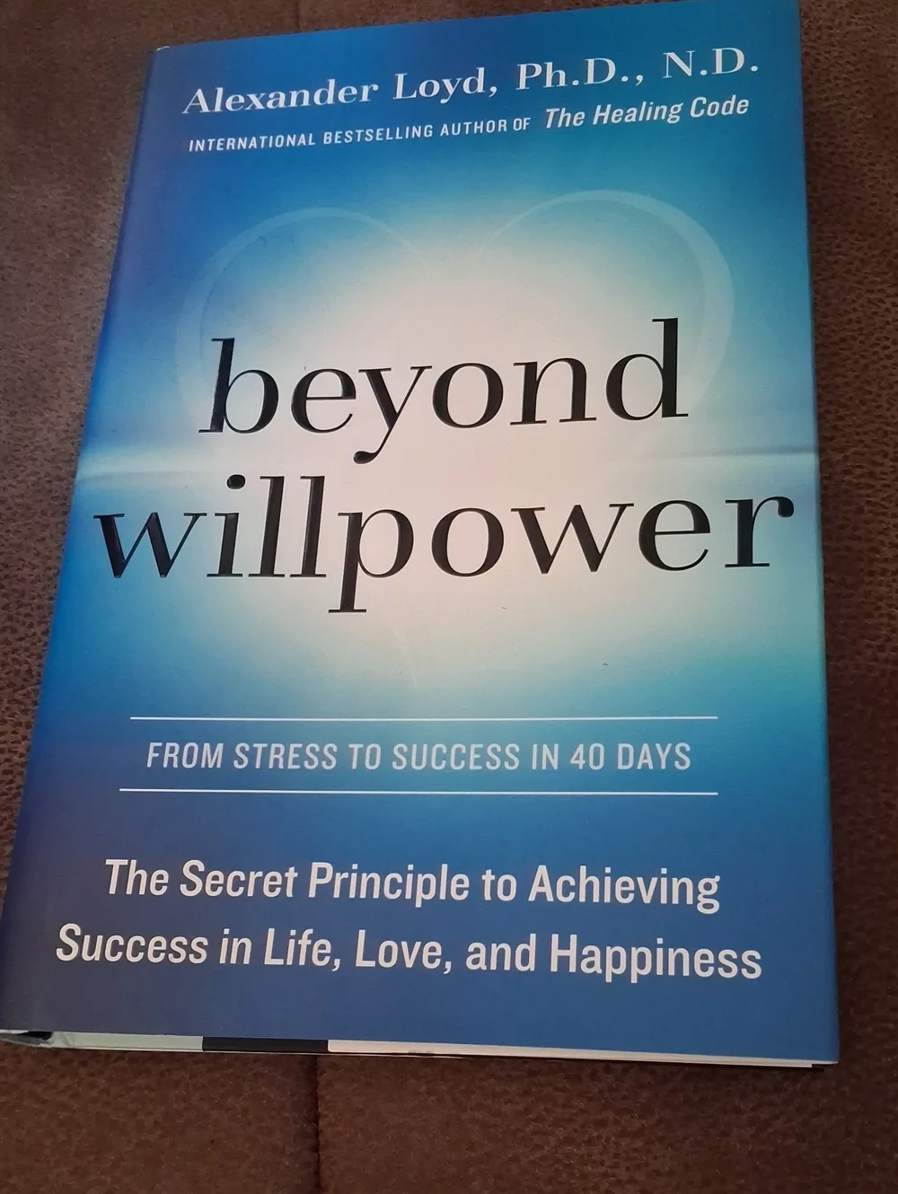 Beyond Willpower by Alexander Loyd Ph.D., N.D. - Blue Paperback Self-Help Book
